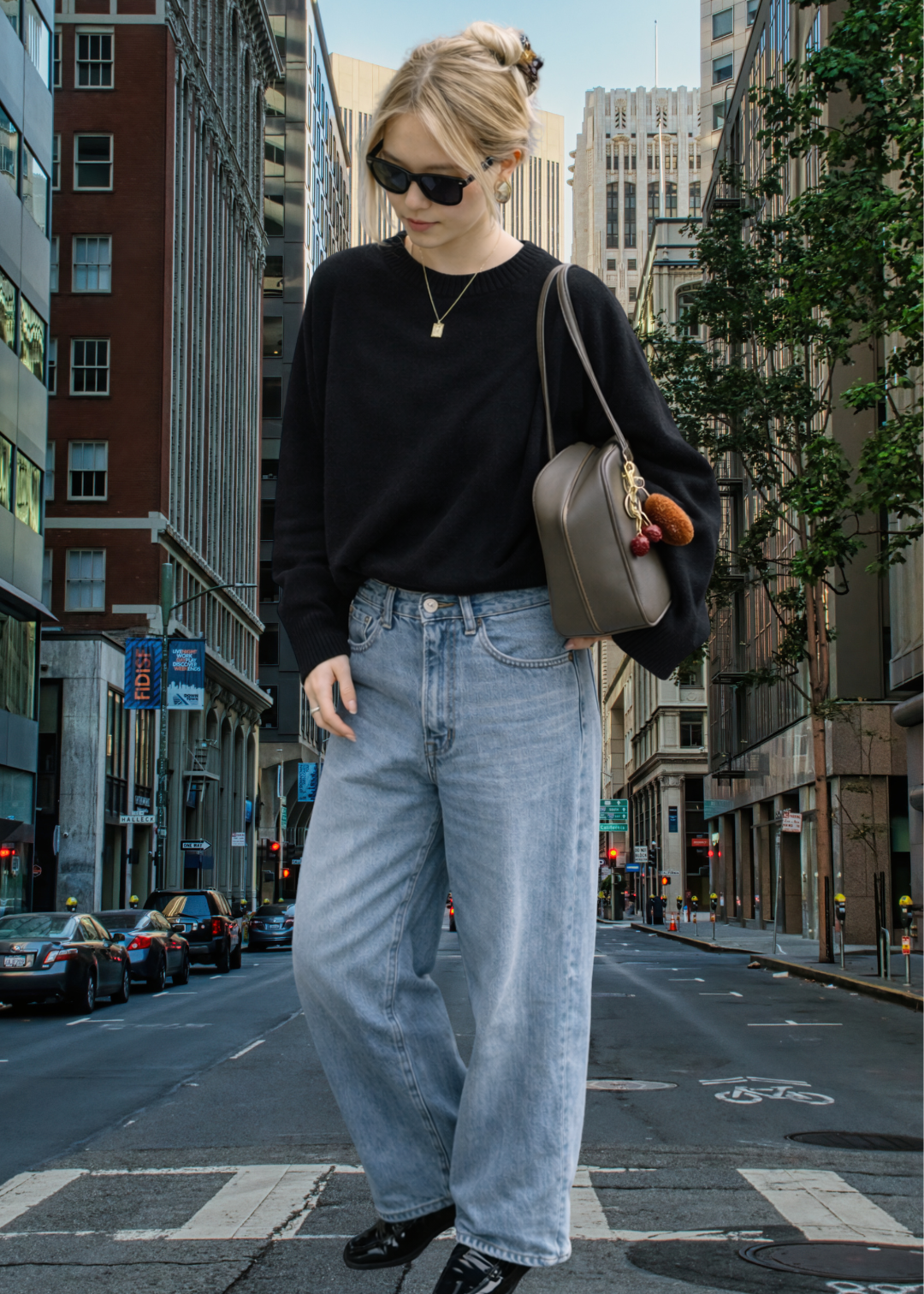 150cm height woman walking on a city street wearing a black sweater, light blue jeans, and sunglasses.
